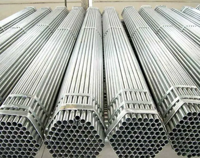 Stainless steel pipes stacked showing various diameters and grades
